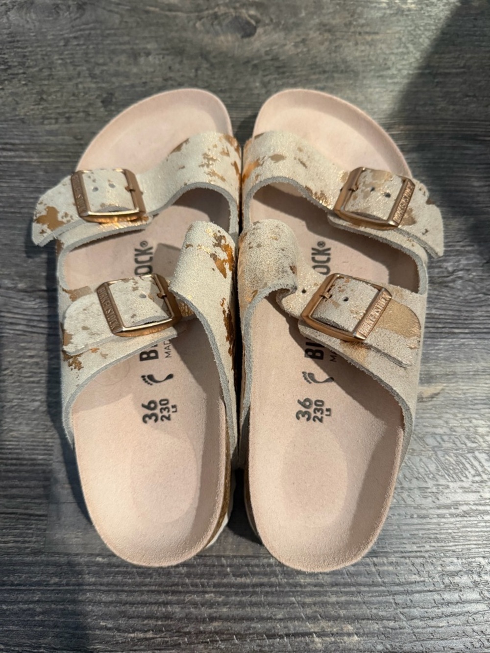 Birkenstock Arizona rose gold metallic Two-Strap Sandals with Gold Buckles